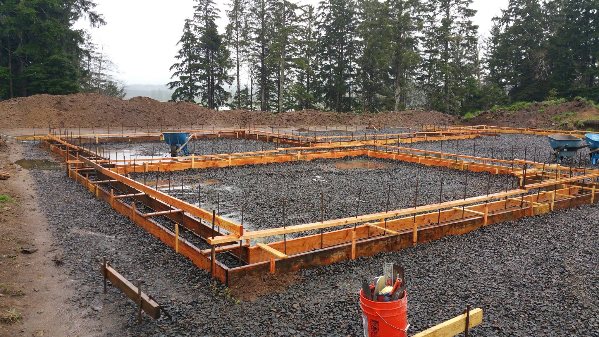 Foundation forms being set for the footings